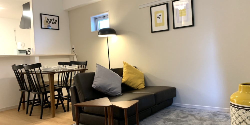 ファミリースイート ノルディック リビング エリア2 | オールステイ知花