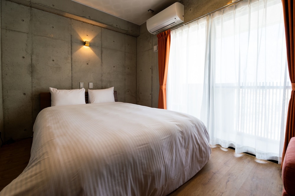 スタンダード ダブルルーム | Little Island Okinawa 松山