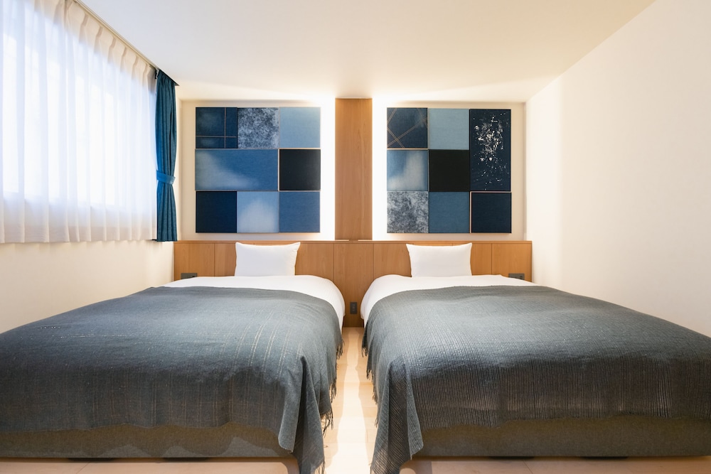 デニムツインダブルベッドルーム 客室1 | NAGI Kurashiki Hotel & Lounge