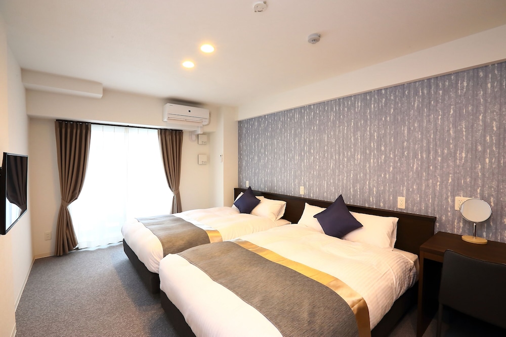 デラックス ツインルーム 客室1 | Marina Sunrise Osaka Bay