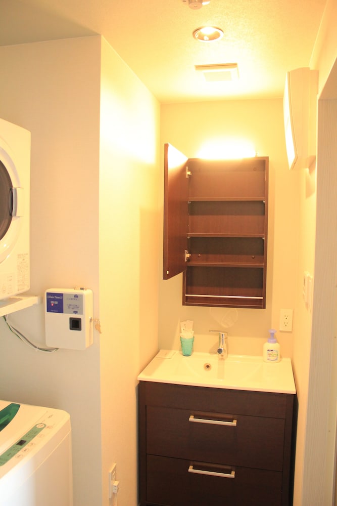 ツインルーム シービュー バスルームのシンク0 | ゲートイン名護