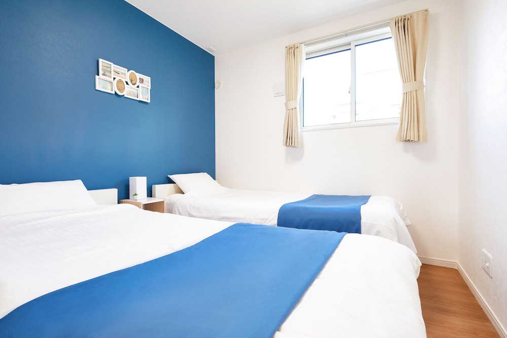 ヴィラ 2 ベッドルーム 客室1 | E-horizon Resort Condominium Nago A