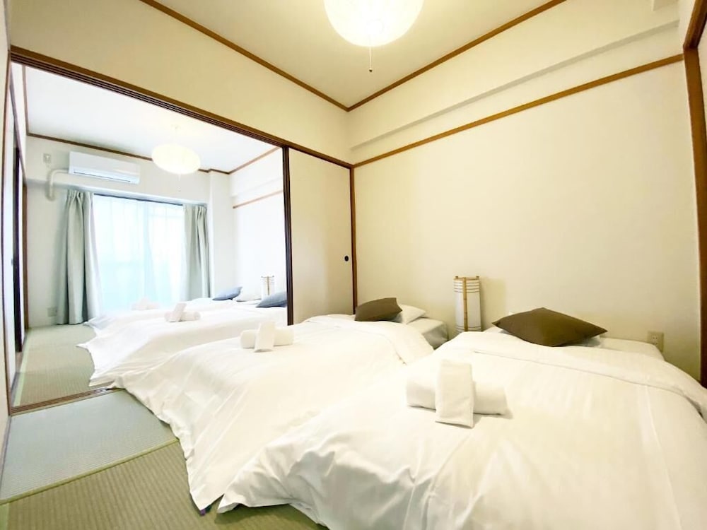 3ベッドルームアパートメント バルコニー付き 703号室 客室1 | おうちホテル段原