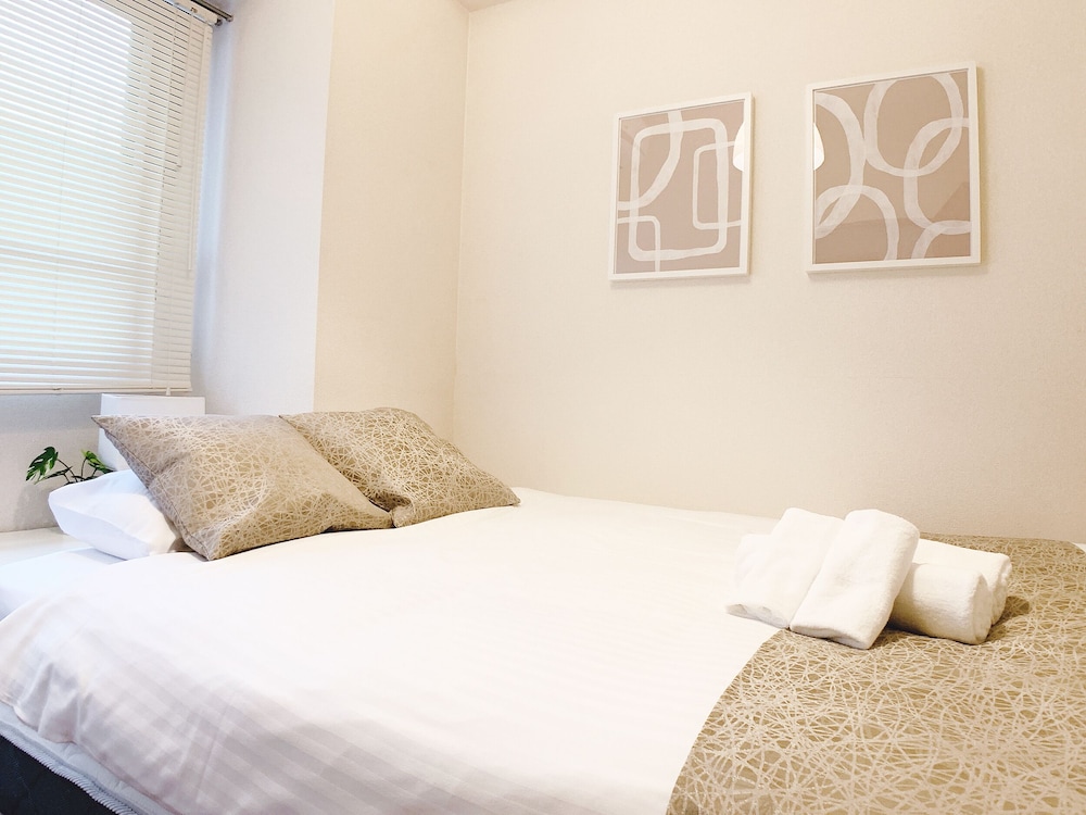 3ベッドルームアパートメント バルコニー付き 303号室 客室2 | おうちホテル段原