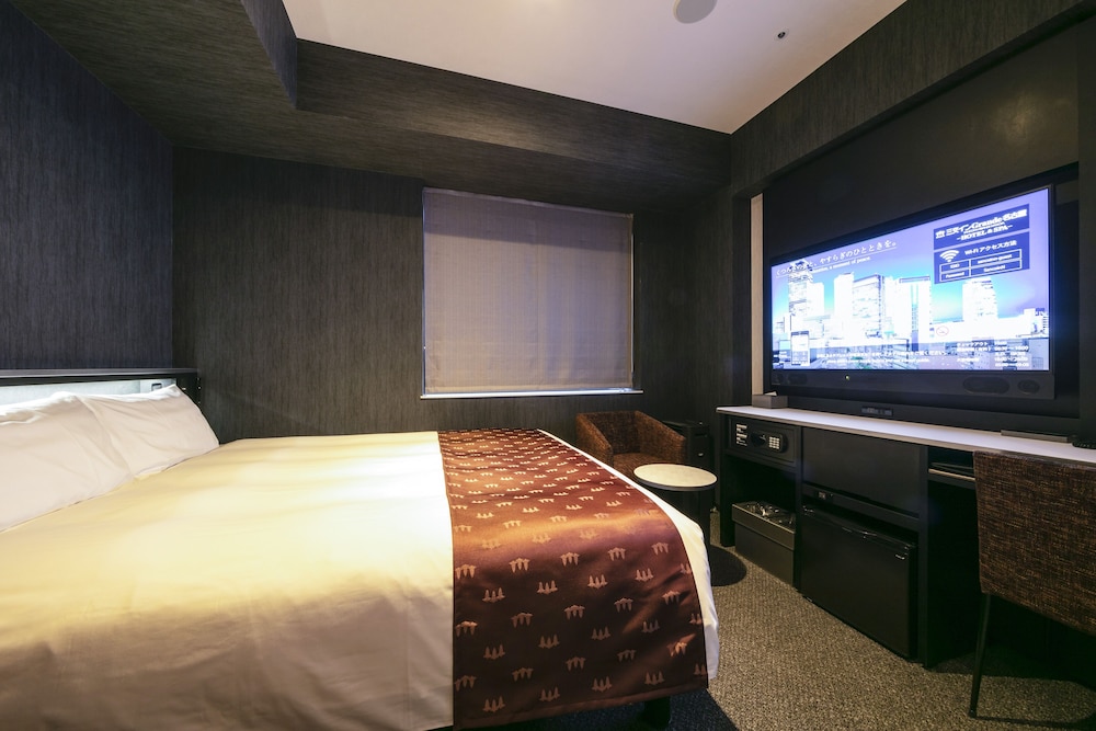 ダブルルーム 客室1 | 三交イン Grande 名古屋