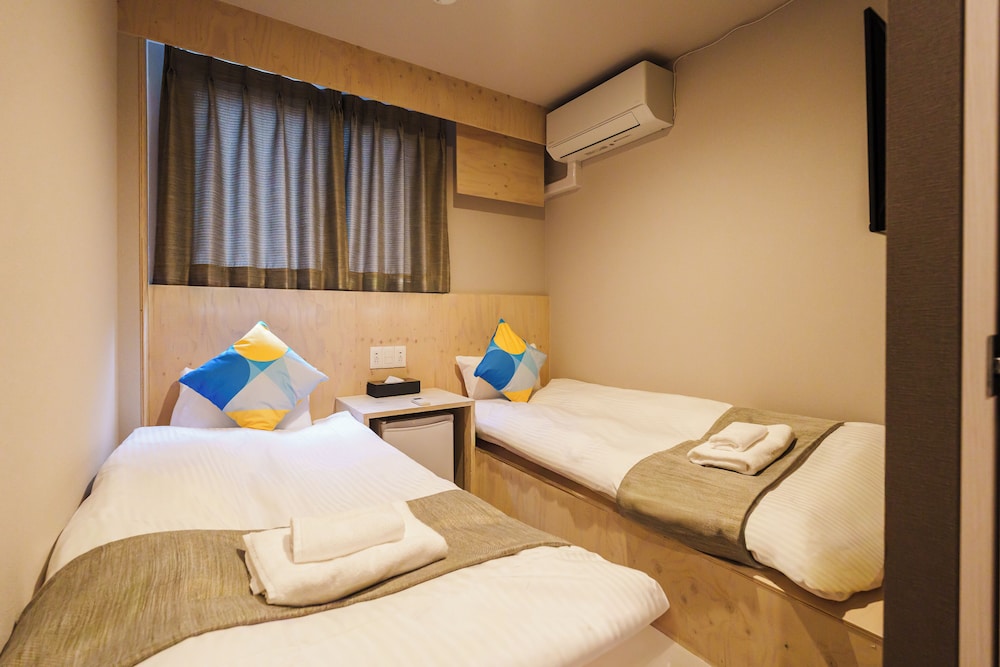 スタンダードツイン(共用シャワー) 客室8 | BAKURO - DOYANEN HOTELS