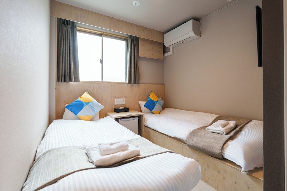 スタンダードツイン(共用シャワー) 客室7 | BAKURO - DOYANEN HOTELS