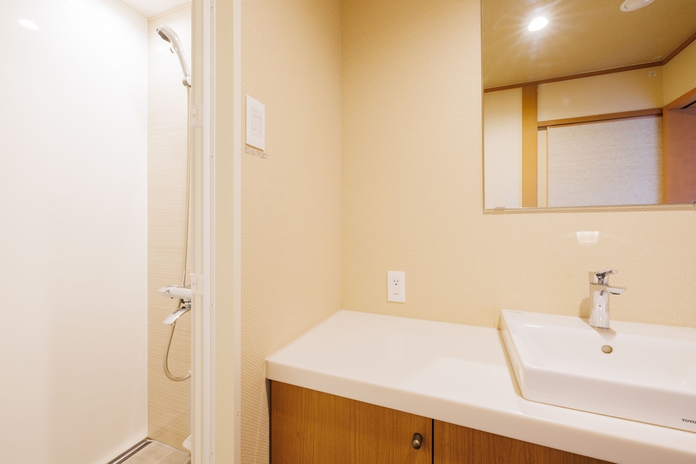 [オーシャンビュー] 和室ツインルーム (シャワーブース付) 禁煙 バスルーム0 | 亀の井ホテル 焼津