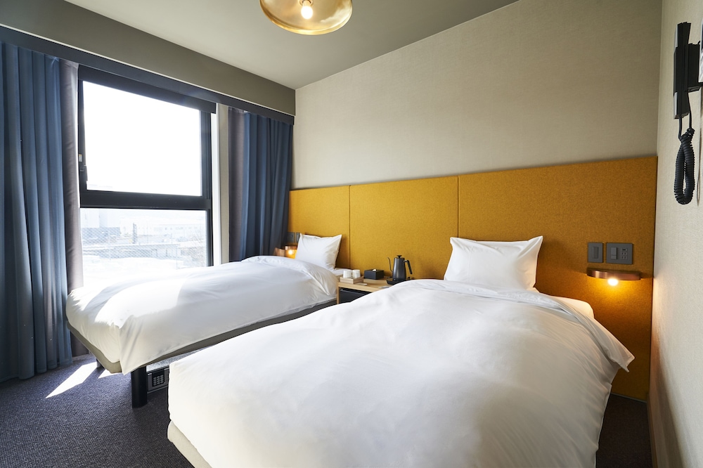 コンフォート ツイン エアウィーヴ パッド 禁煙 (シャワーブース付き*バスタブはありません) 客室1 | THE REIGN HOTEL KYOTO