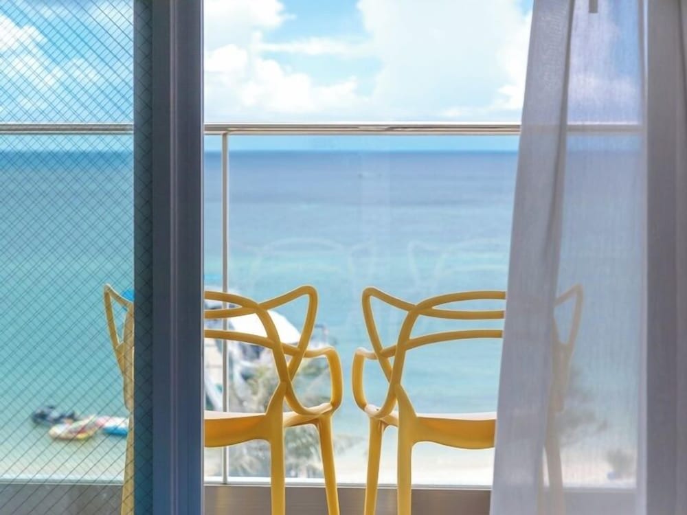 トップフロア オーシャンビュー ツインルーム 客室5 | KARIYUSHI LCH.RESORT on The Beach