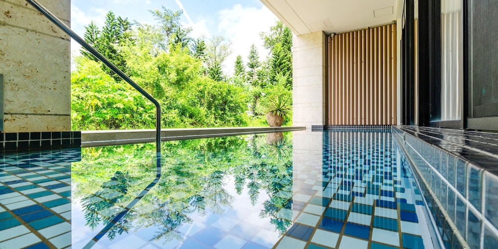 【プライベートプール】 デラックス・スイートルーム テラス / パティオ0 | UMITO OKINAWA ONNASON