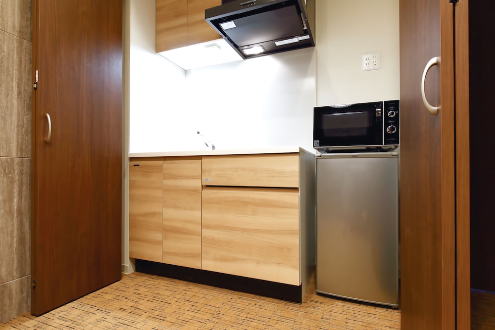 スイートルーム(69sqm) 専用キッチン0 | ラクスケアホテル