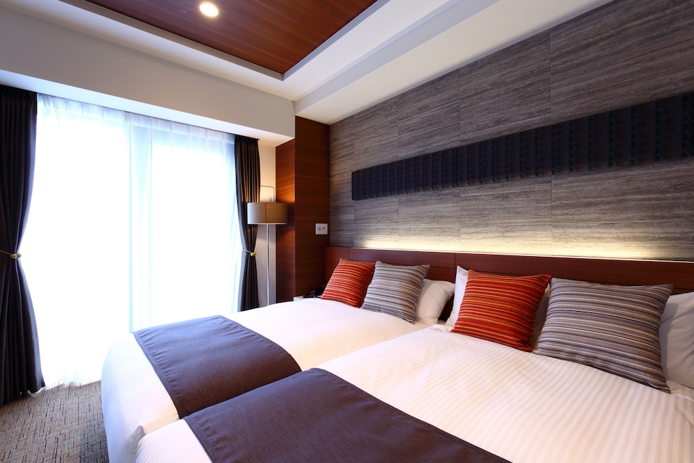 デラックス ツインルーム (38sqm) 客室1 | ラクスケアホテル