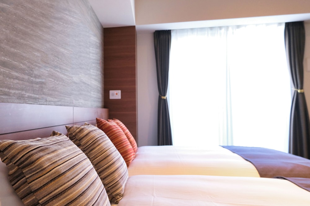 和洋室ファミリールーム(34sqm) 客室3 | ラクスケアホテル