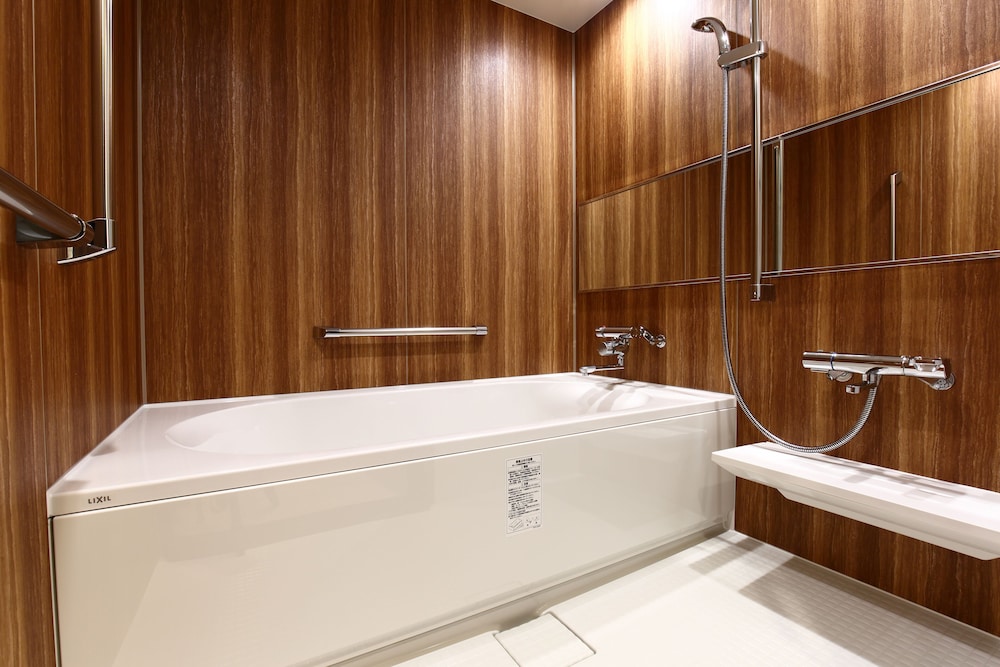 デラックス ツインルーム (38sqm) バスルーム0 | ラクスケアホテル