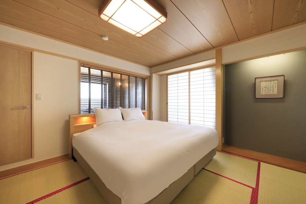 コンフォート スイート ベッド (複数台) 禁煙 専用バスルーム 客室2 | ホテル椿野