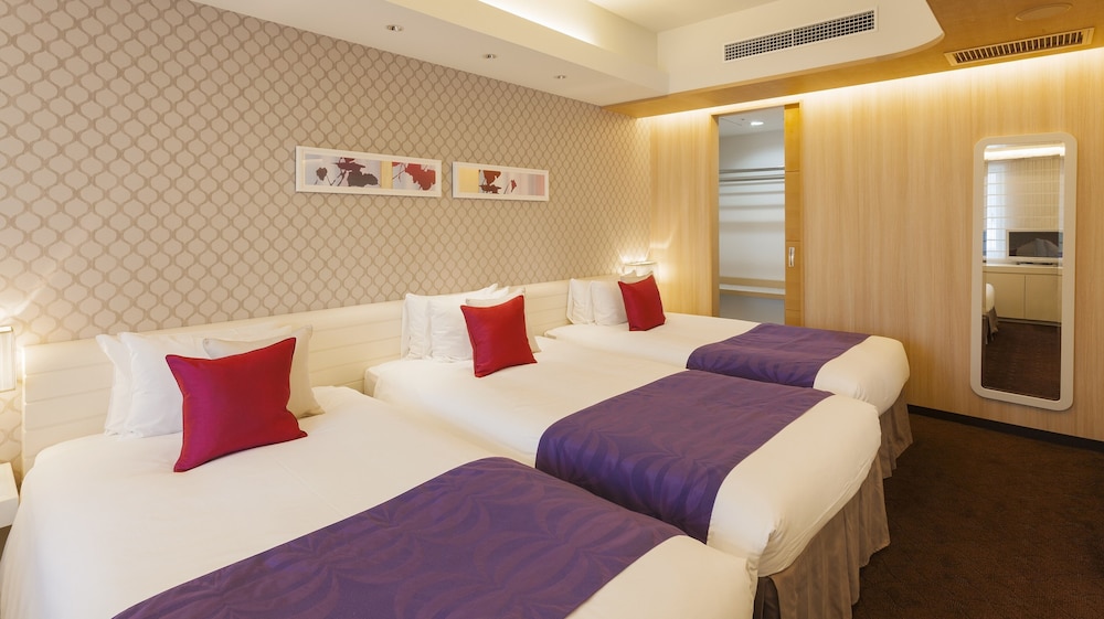 ジュニア スイート ベッド (複数台) 客室1 | ホテル エルセラーン大阪