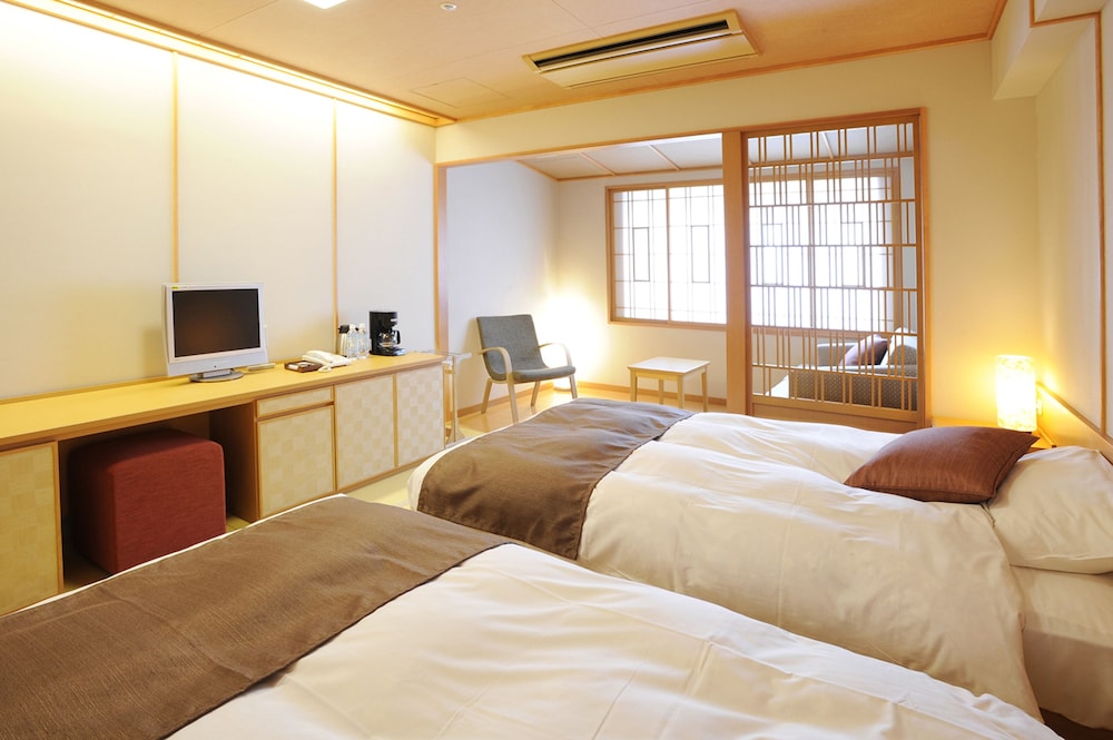 [朝食/夕食 ビュッフェ込み] Yukihotaru ツインルーム 禁煙 客室5 | ホテル大雪　ONSEN＆CANYON　RESORT