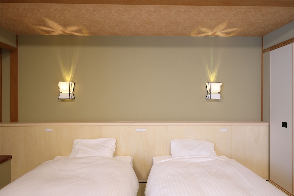 祇園の中心地 ! ベッドタイプ和室 客室2 | 祇園旅館 花楽