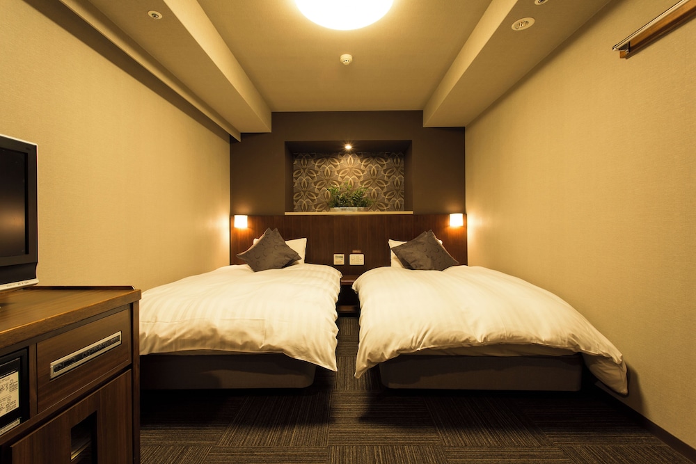 ツインルーム 禁煙 (22.4-23.0平米) 客室1 | 天然温泉　六花の湯　ドーミーイン熊本