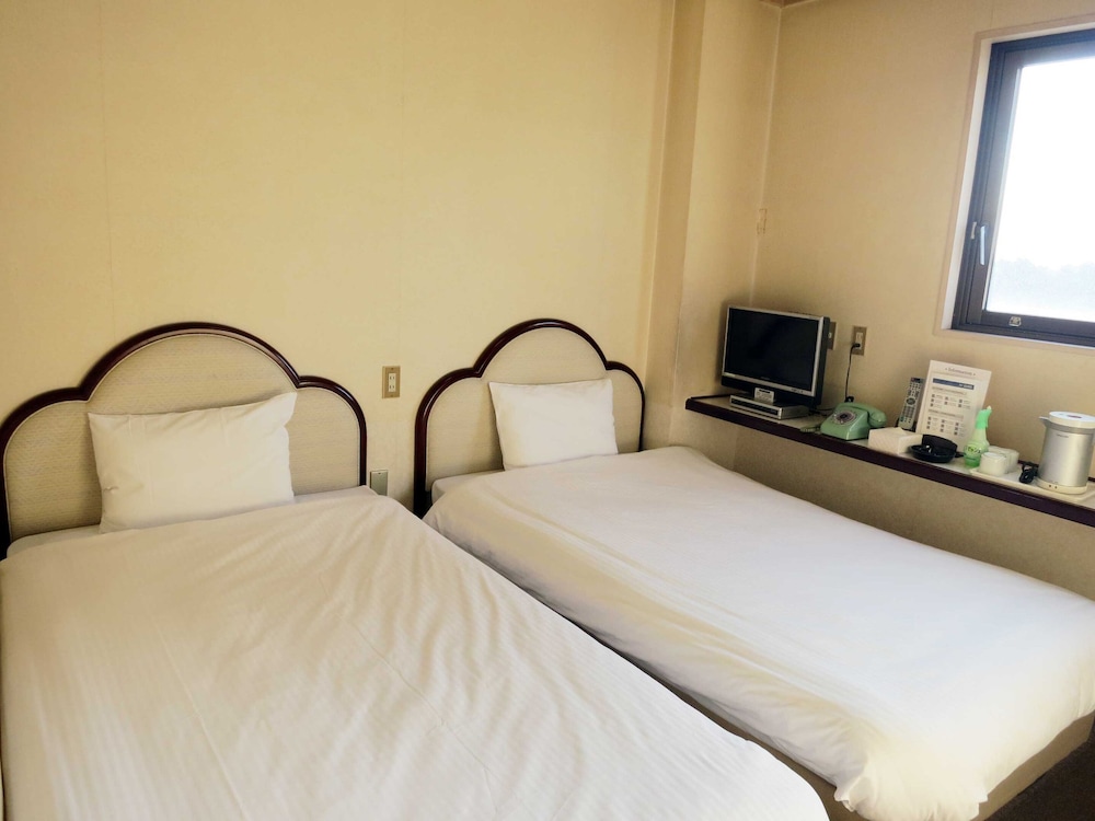 ツインルーム 喫煙可 客室2 | 平和台 ホテル 大手門