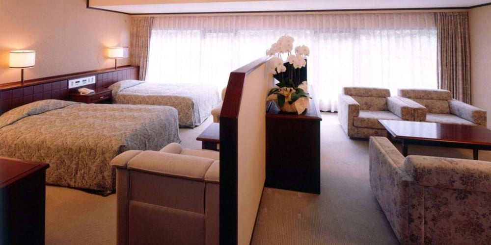 デラックス ツインルーム ベッド (複数台) マウンテンビュー 客室2 | 奥道後　壱湯の守