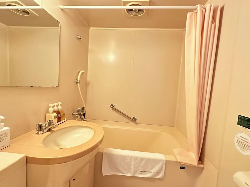 デラックス ツインルーム ベッド (複数台) マウンテンビュー バスルーム0 | 奥道後　壱湯の守