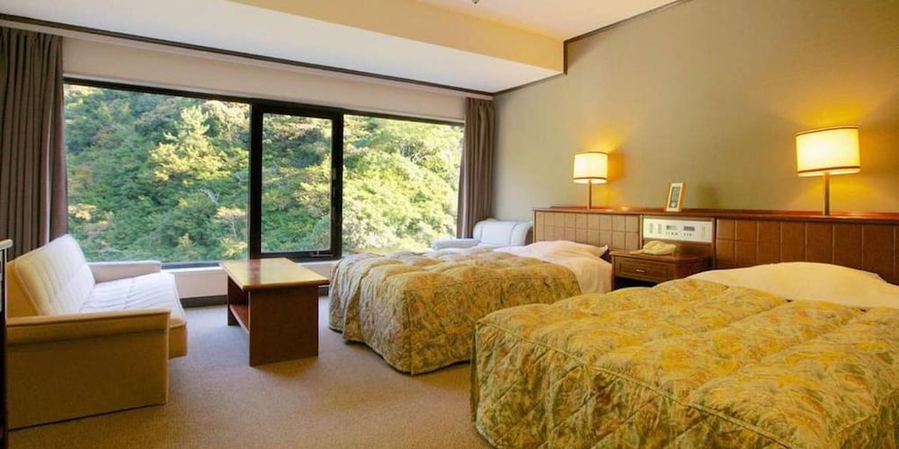 ツインルームシングルサイズベッド 2 台 客室3 | 奥道後　壱湯の守