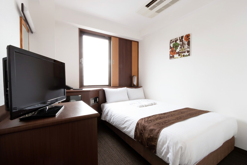 セミダブルルーム [禁煙] 13.5平米 <シモンズベッド/デュベスタイル> | 東洋ホテル