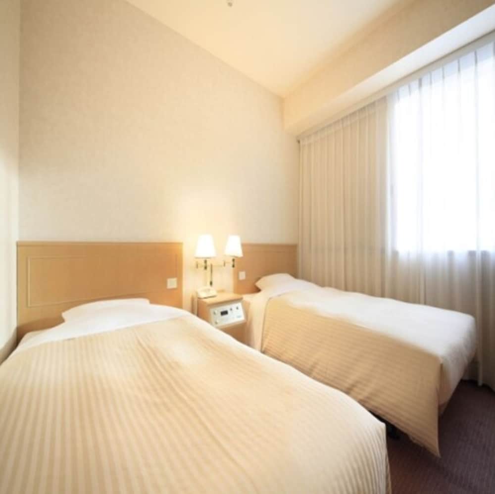 ツインルームシングルサイズベッド 2 台 禁煙 客室1 | 甲府ワシントンホテルプラザ