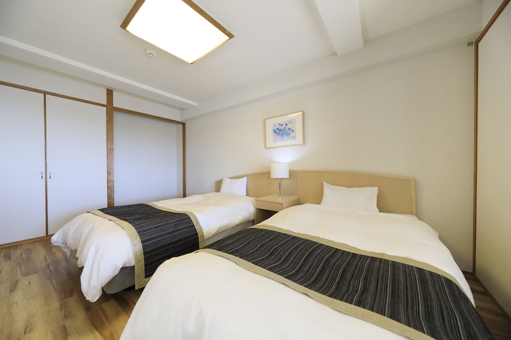 [禁煙] 洋室 (ベッド4台)/オーシャンビュー 客室3 | 勝浦ヒルトップホテル＆レジデンス