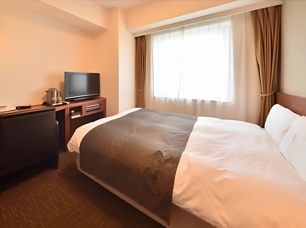 喫煙ダブルルーム　(14.4ｍ²) 客室4 | 天然温泉 樽前の湯 ドーミーイン苫小牧