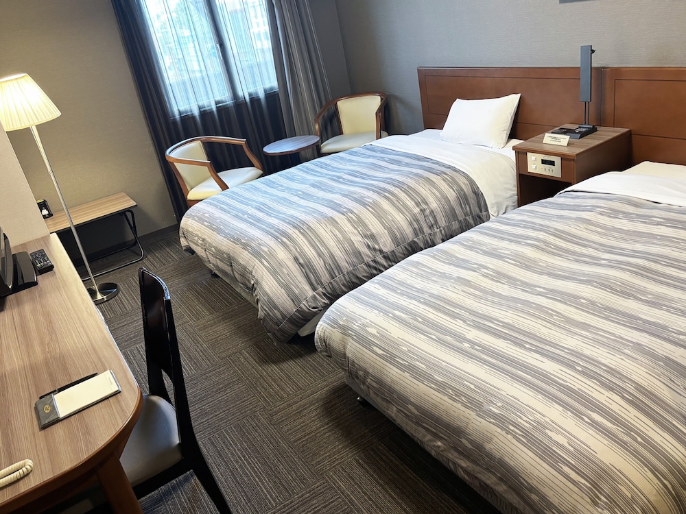 ツインルームシングルサイズベッド 2 台喫煙可 客室4 | ホテルルートイン網走駅前