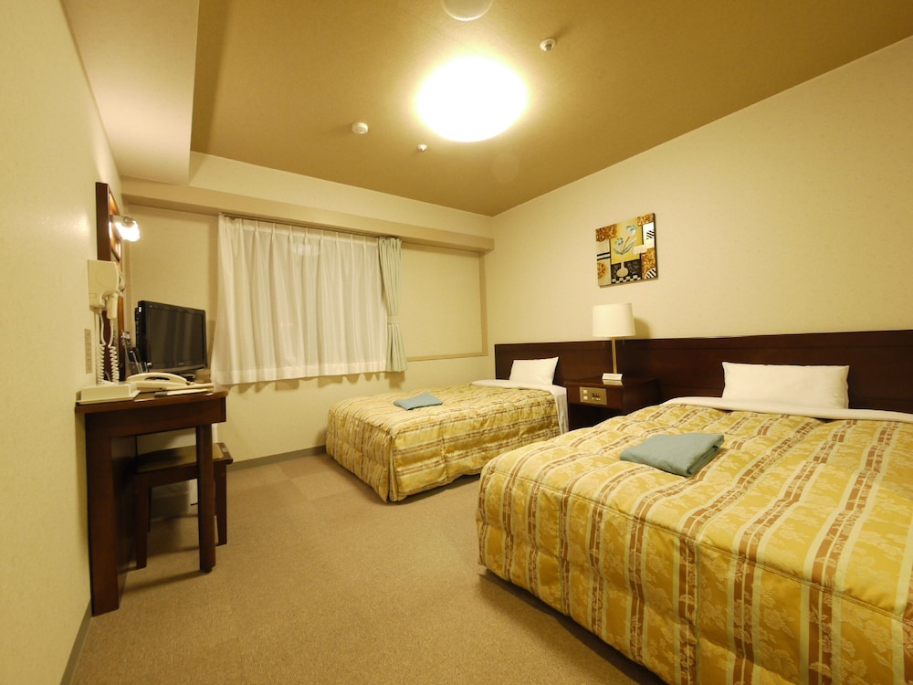 ツインルームシングルサイズベッド 2 台喫煙可 | ルートイングランティア秋田 SPA RESORT