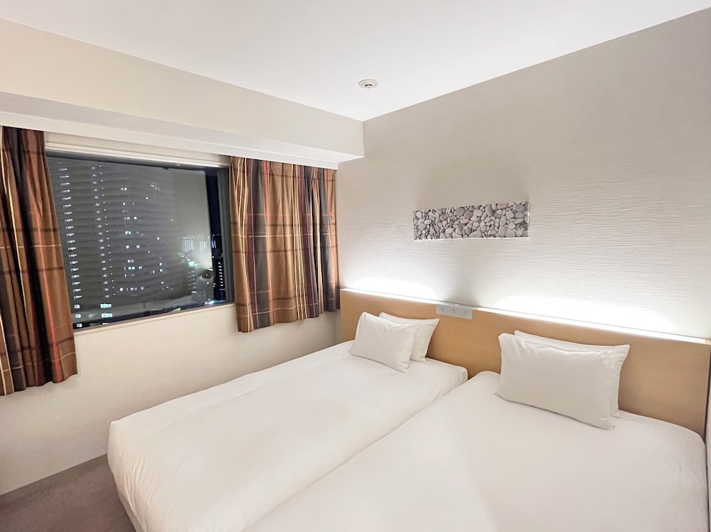 ツインルーム 禁煙 (Hollywood Twin) | ホテル京阪 京橋 グランデ