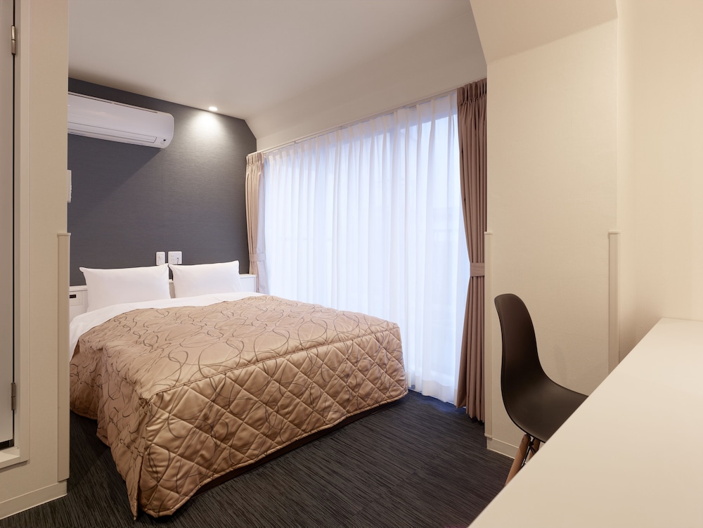 ダブルルーム 禁煙 (16平米/ベッド幅150cm/エレベーターなし) | ホテルニュー東北