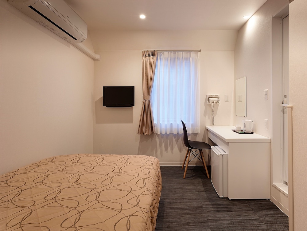 セミダブルルーム 禁煙 (11平米/ベッド幅120cm/エレベーターなし) | ホテルニュー東北