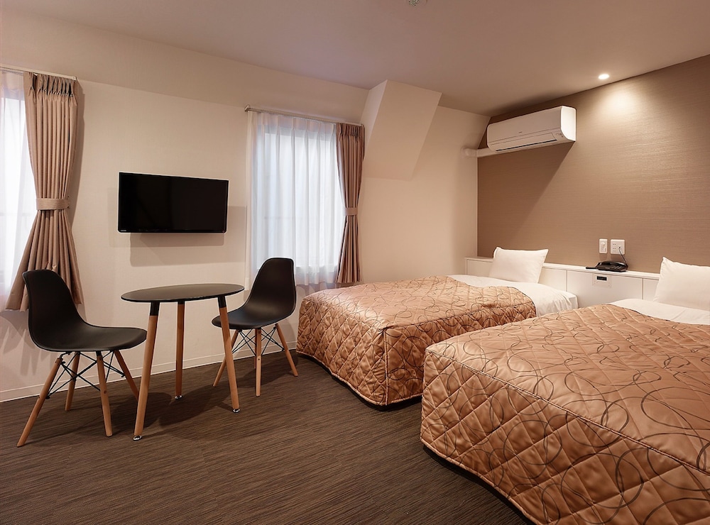 ツインルーム 禁煙 (18平米/ベッド幅120cm/エレベーターなし) | ホテルニュー東北