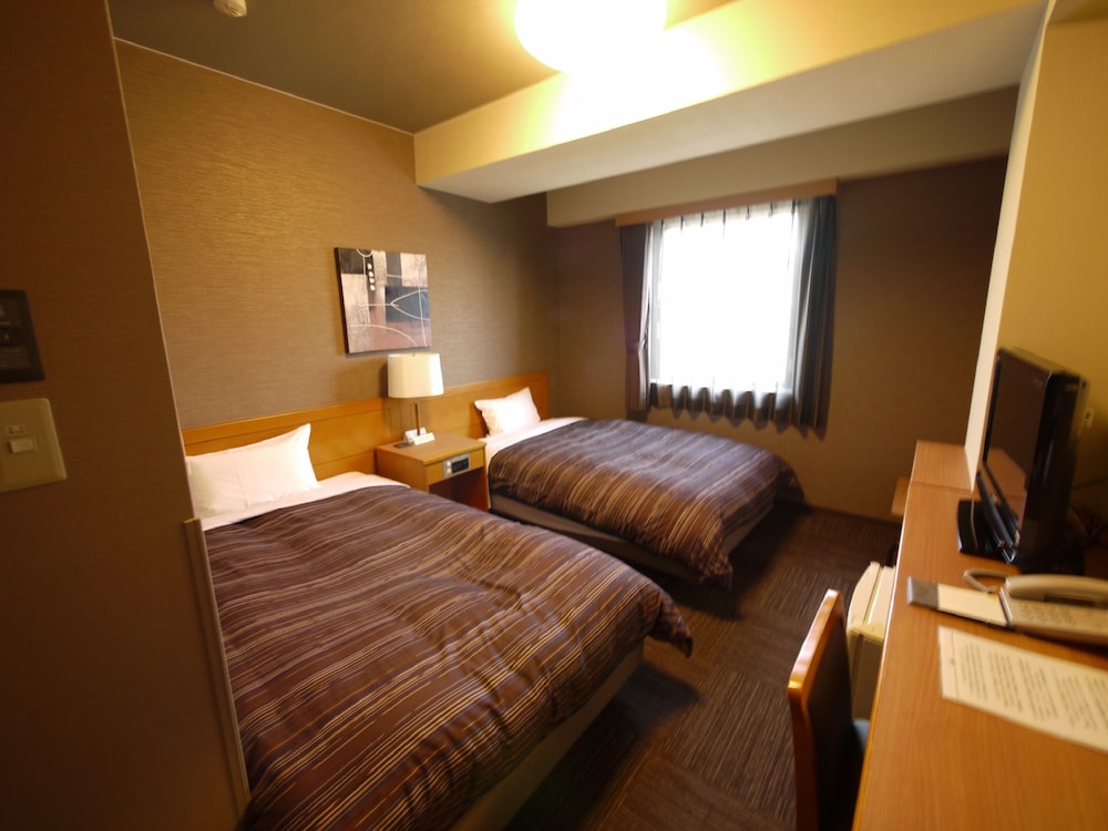 ツインルームシングルサイズベッド 2 台禁煙 | ホテルルートイン常滑駅前