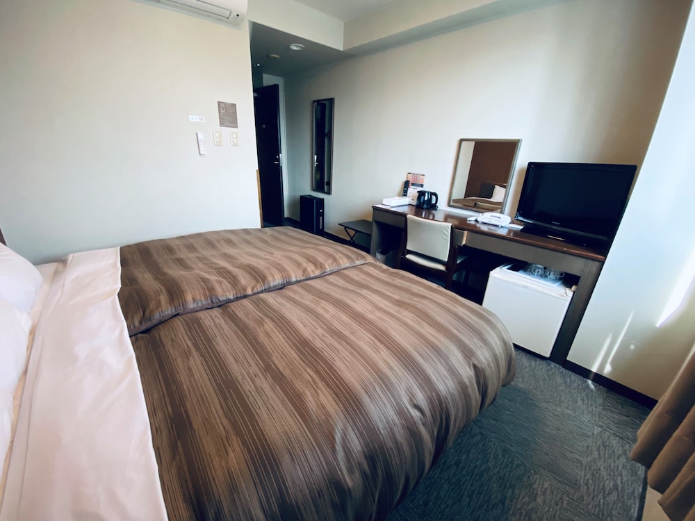 ファミリー ダブルルーム キングベッド 1 台 喫煙可 客室1 | ホテルルートイン上諏訪