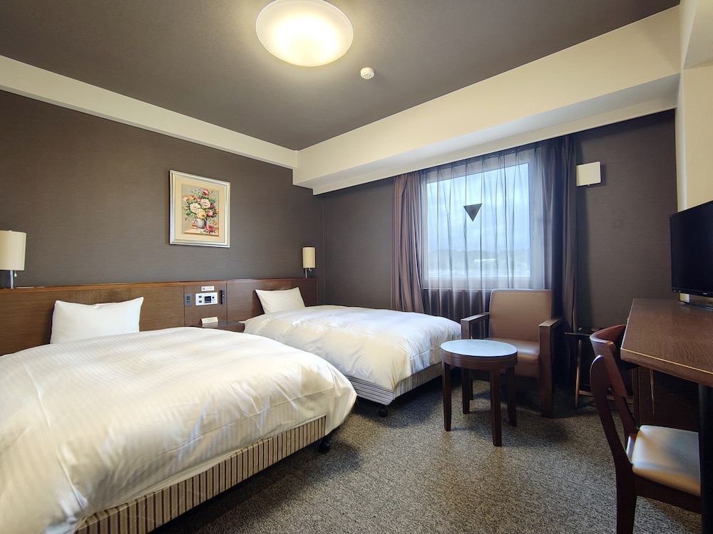 本館 ツインルーム 喫煙可（ベッド幅120cm） 客室1 | ホテルルートインいわき泉駅前