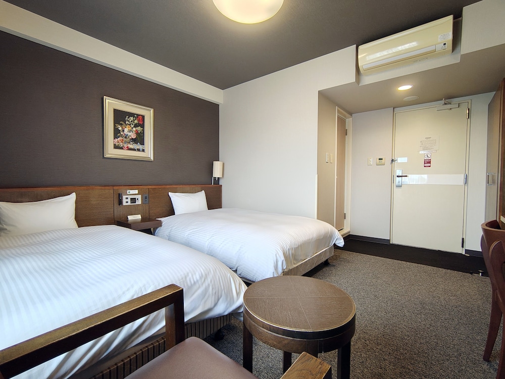 本館 ツインルーム 喫煙可（ベッド幅120cm） 客室2 | ホテルルートインいわき泉駅前