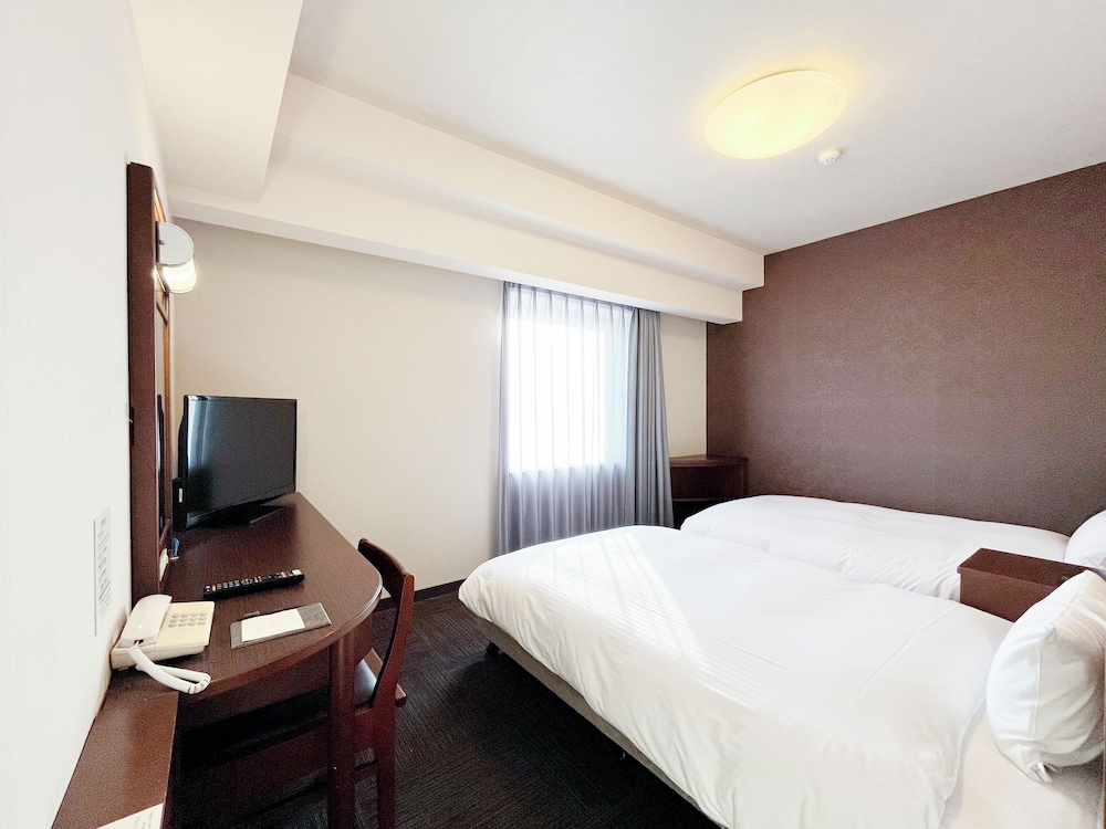 ツインルームシングルサイズベッド 2 台喫煙可 客室1 | ホテルルートイン郡山南
