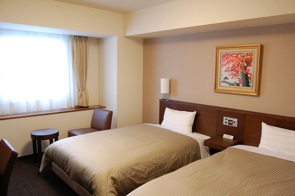 客室1 | ルートイン グランティア氷見 和蔵の宿