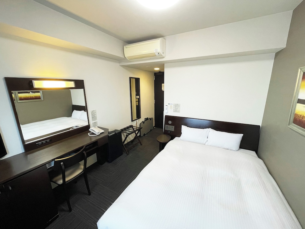 客室1 | ルートイン グランティア氷見 和蔵の宿