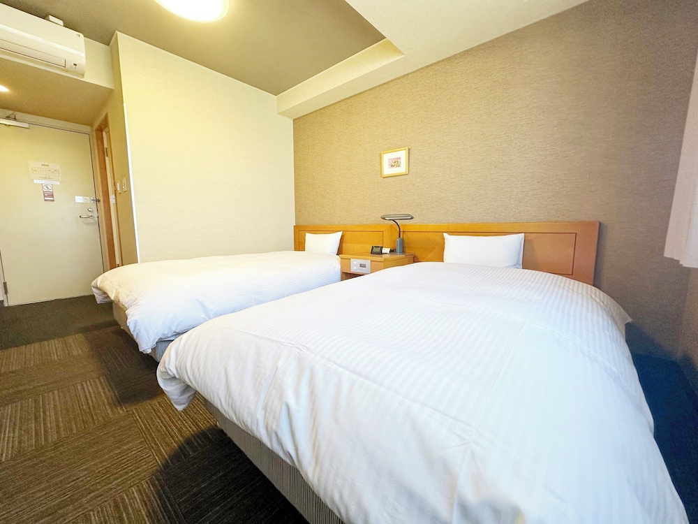 ツインルームシングルサイズベッド 2 台喫煙可 | ホテルルートイン福井大和田
