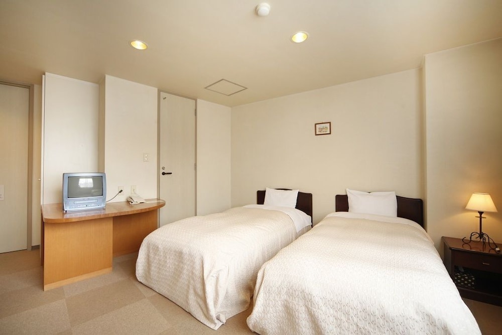 ツインルーム (バス無し) 客室2 | HOTEL 24 sweets HAKUBA