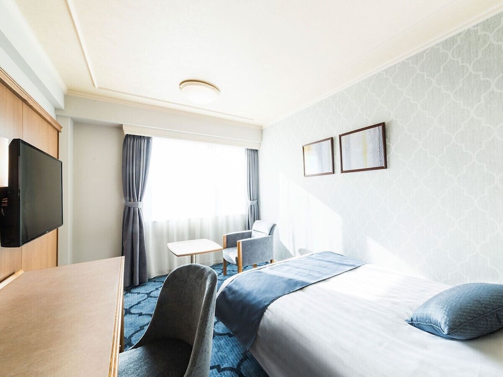 東館スモールダブルルーム 禁煙 | 千里阪急ホテル（大阪）