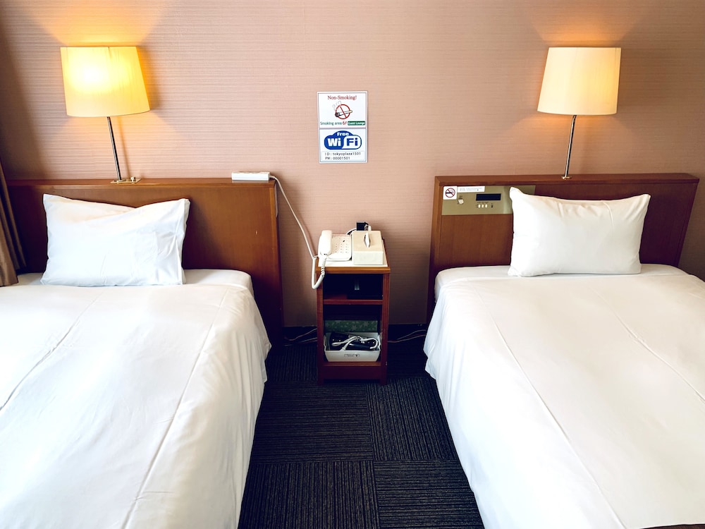 スタンダード ツインルーム シングルベッド 2 台 禁煙 客室2 | 東京 プラザ ホテル