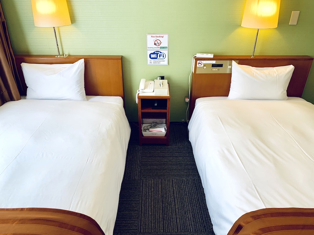 スタンダード ツインルーム シングルベッド 2 台 禁煙 客室3 | 東京 プラザ ホテル